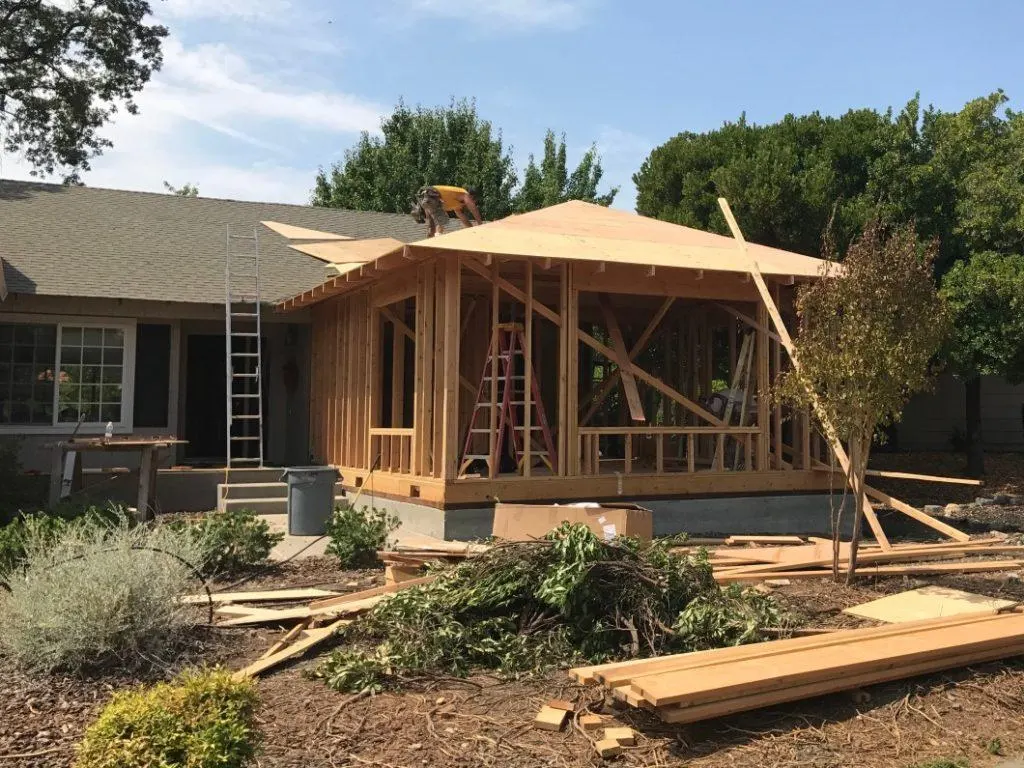 Construction of room extensions and home expansions designed to increase living space, functionality, and long-term home value