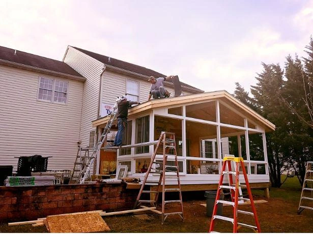 Construction sunrooms and enclosed porches designed to expand living space with natural light, comfort, and year-round functionality