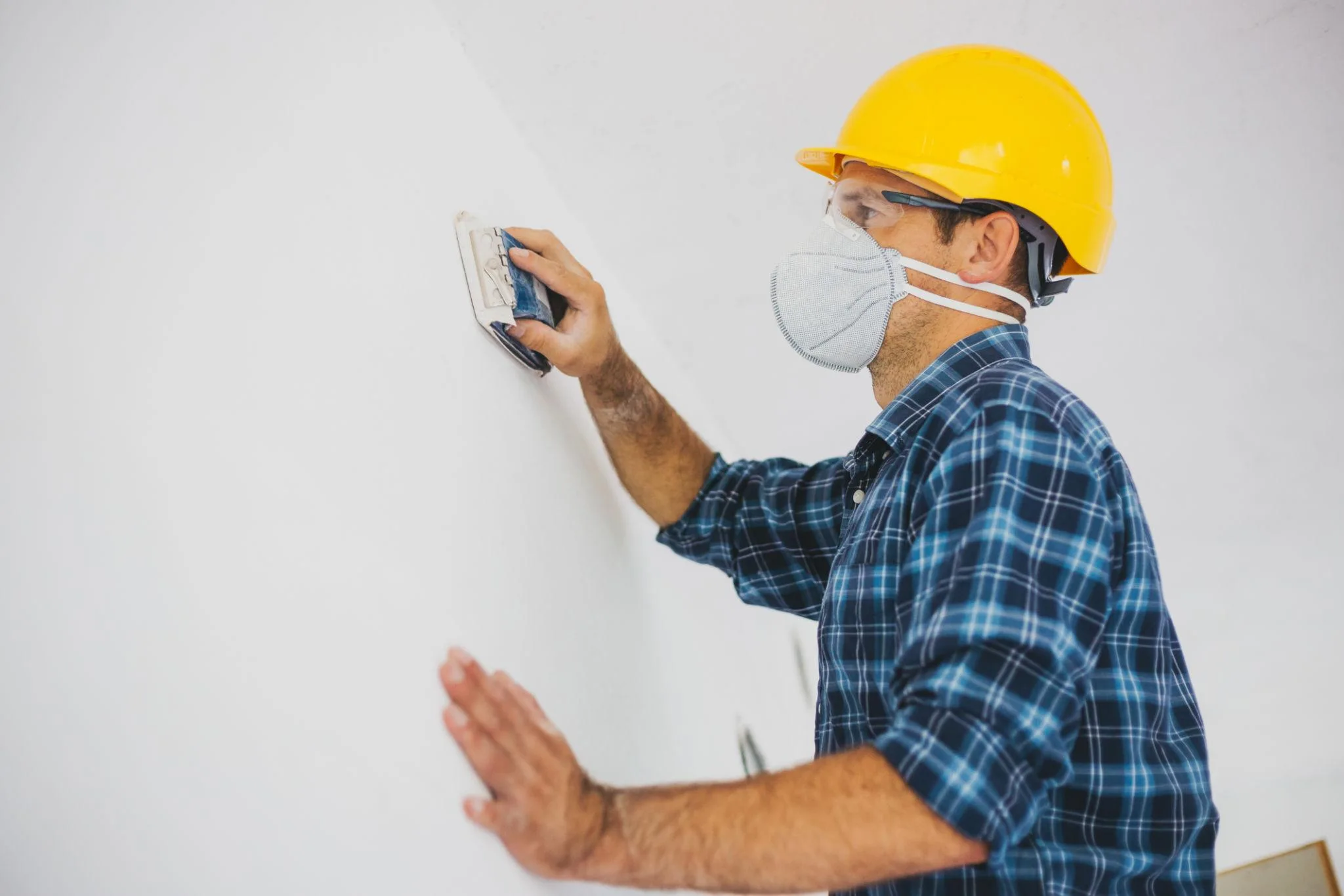 Wall refinishing and surface preparation services designed to create smooth surfaces and long-lasting professional paint finishes